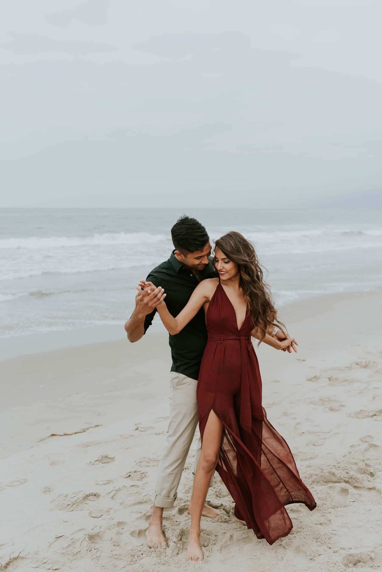 Couple At Beach Dancing On White Sand Picture