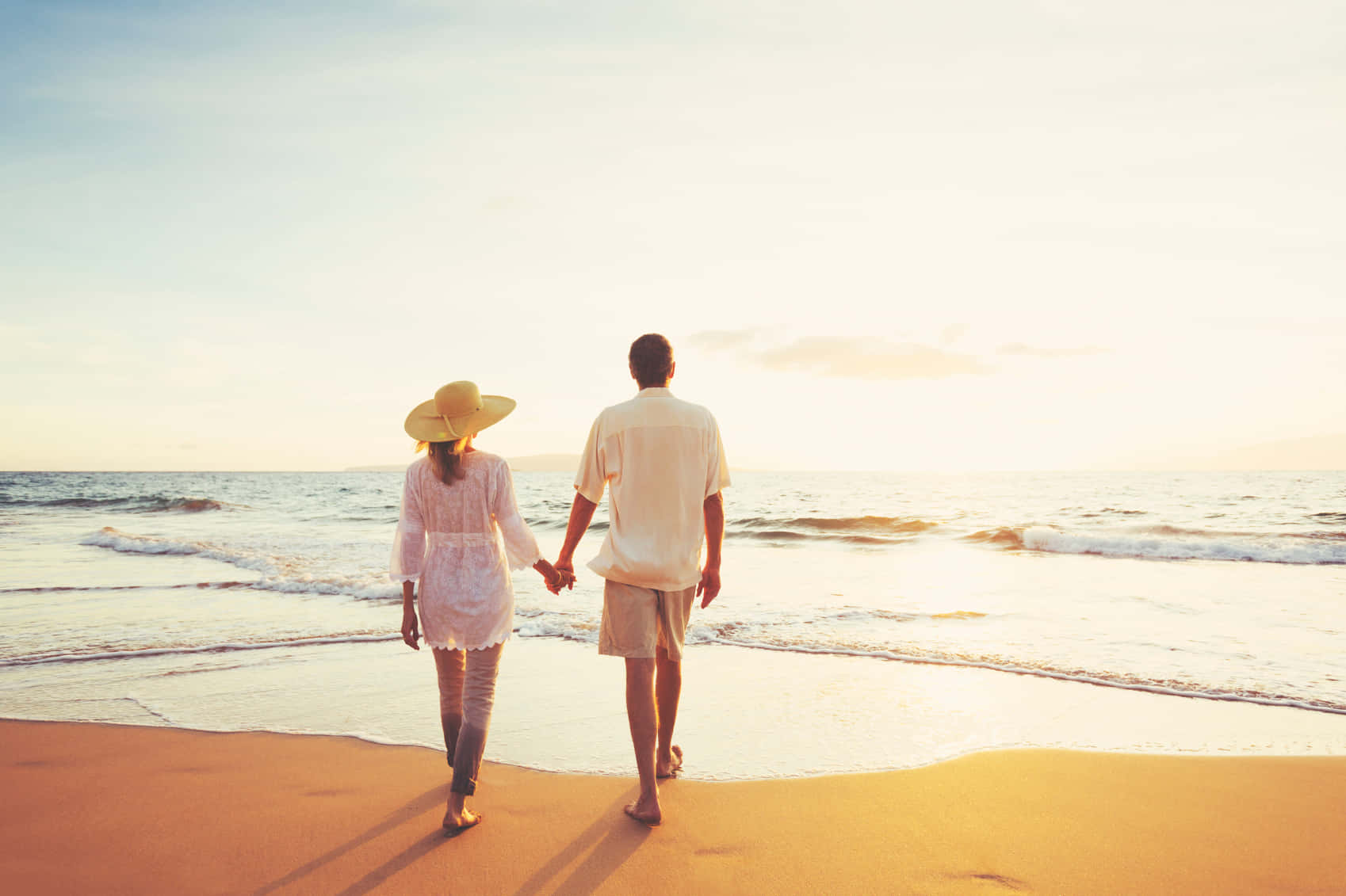 Couple At Beach Walking And Holding Hands Picture