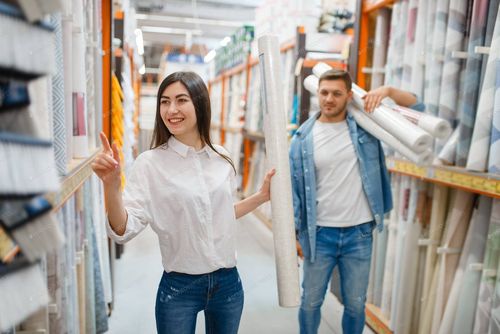 Couple Buying Materials In Store Wallpaper