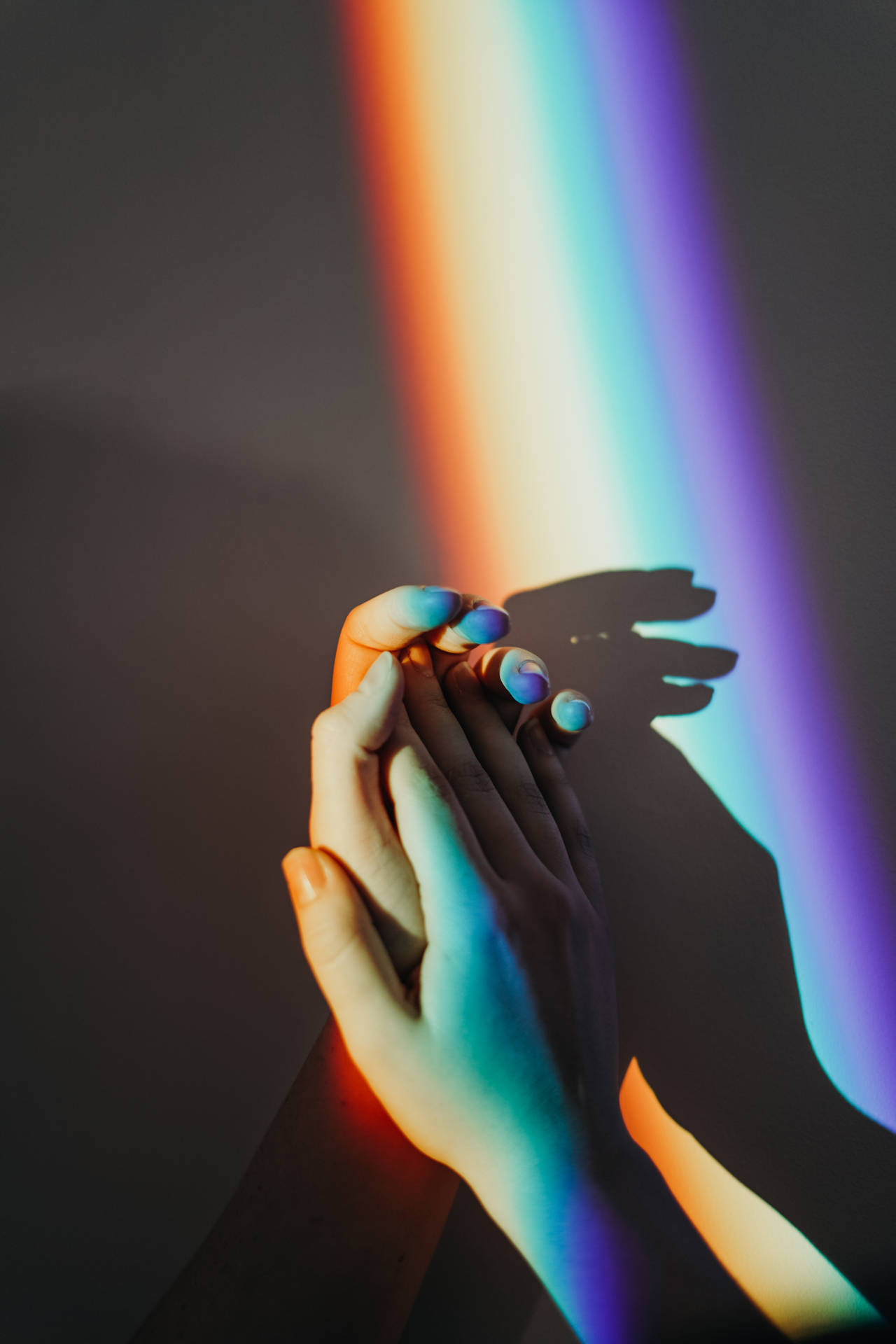 Couple Hands Rainbow Light