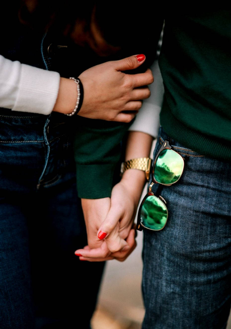 Couple Holding Hands With Sunglasses Wallpaper