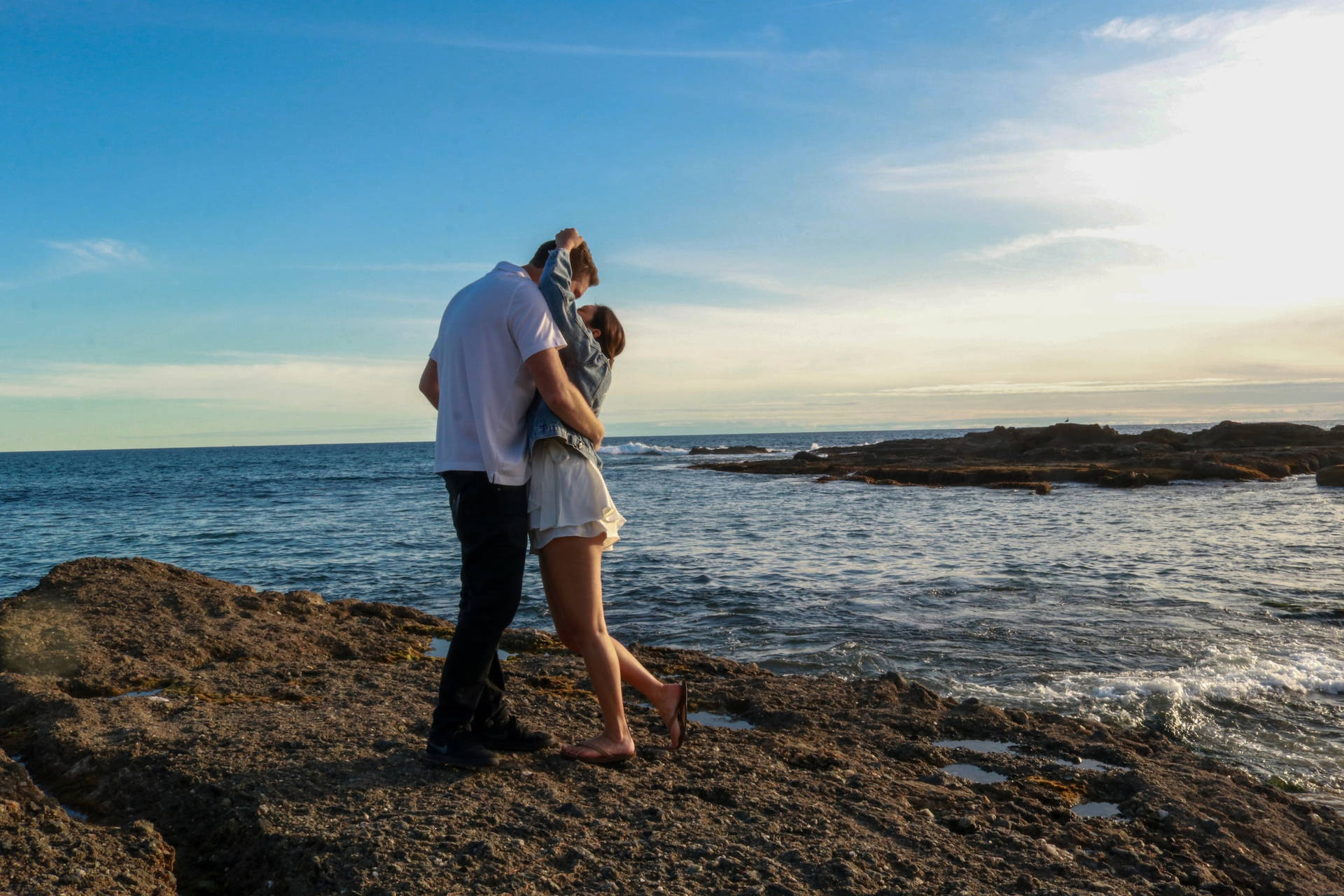Couple Hugging At Treasure Island Laguna Beach California Wallpaper