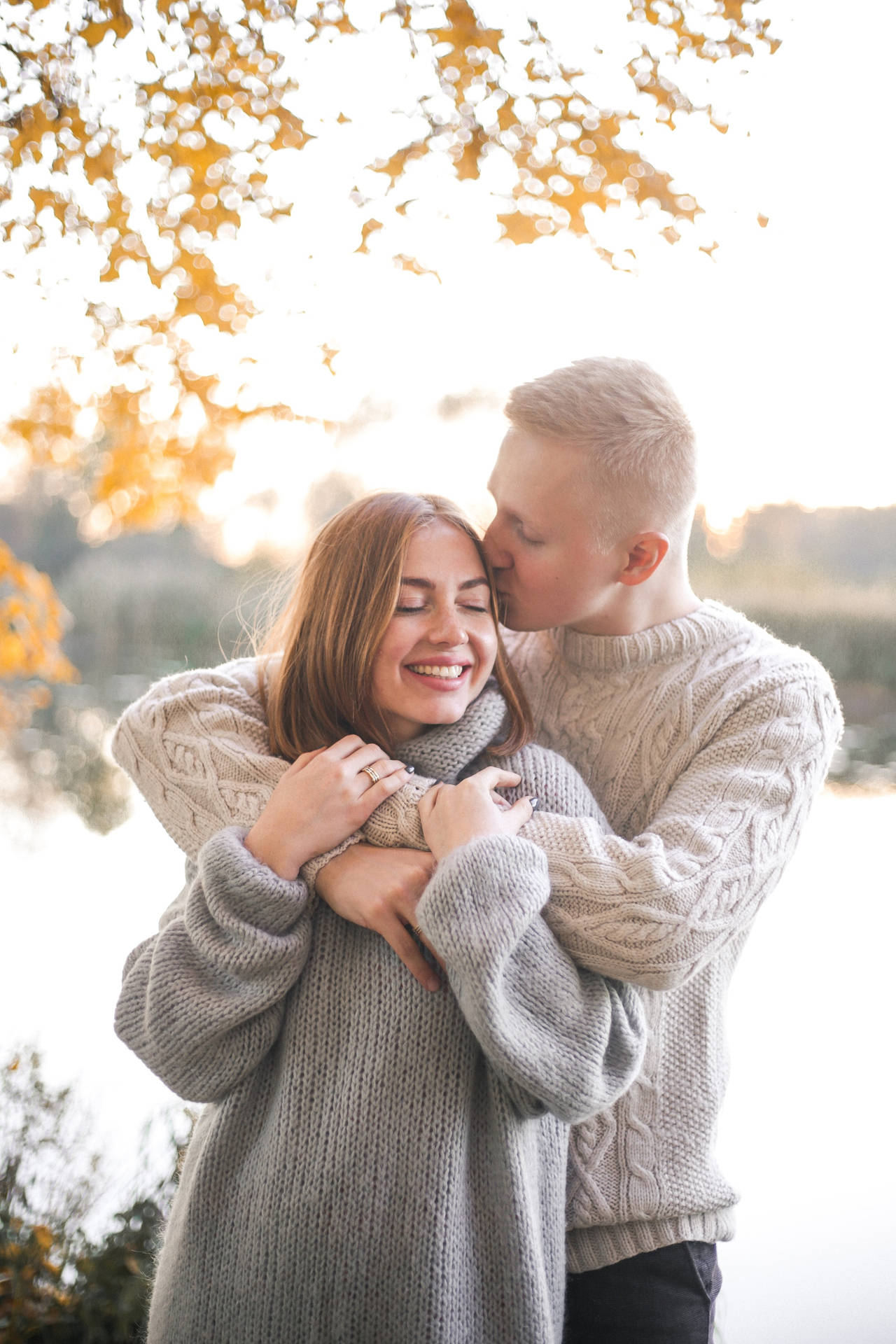 Couple Hugging Back Hug In Autumn Wallpaper