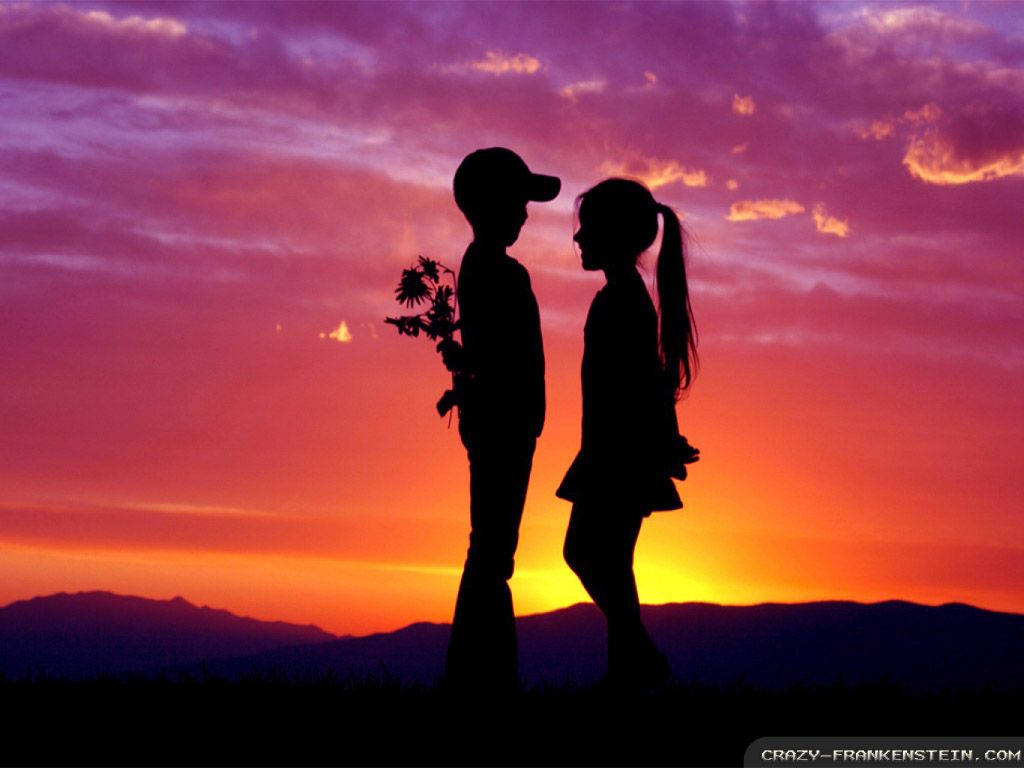 Couple In Love Silhouette During Sunset Wallpaper