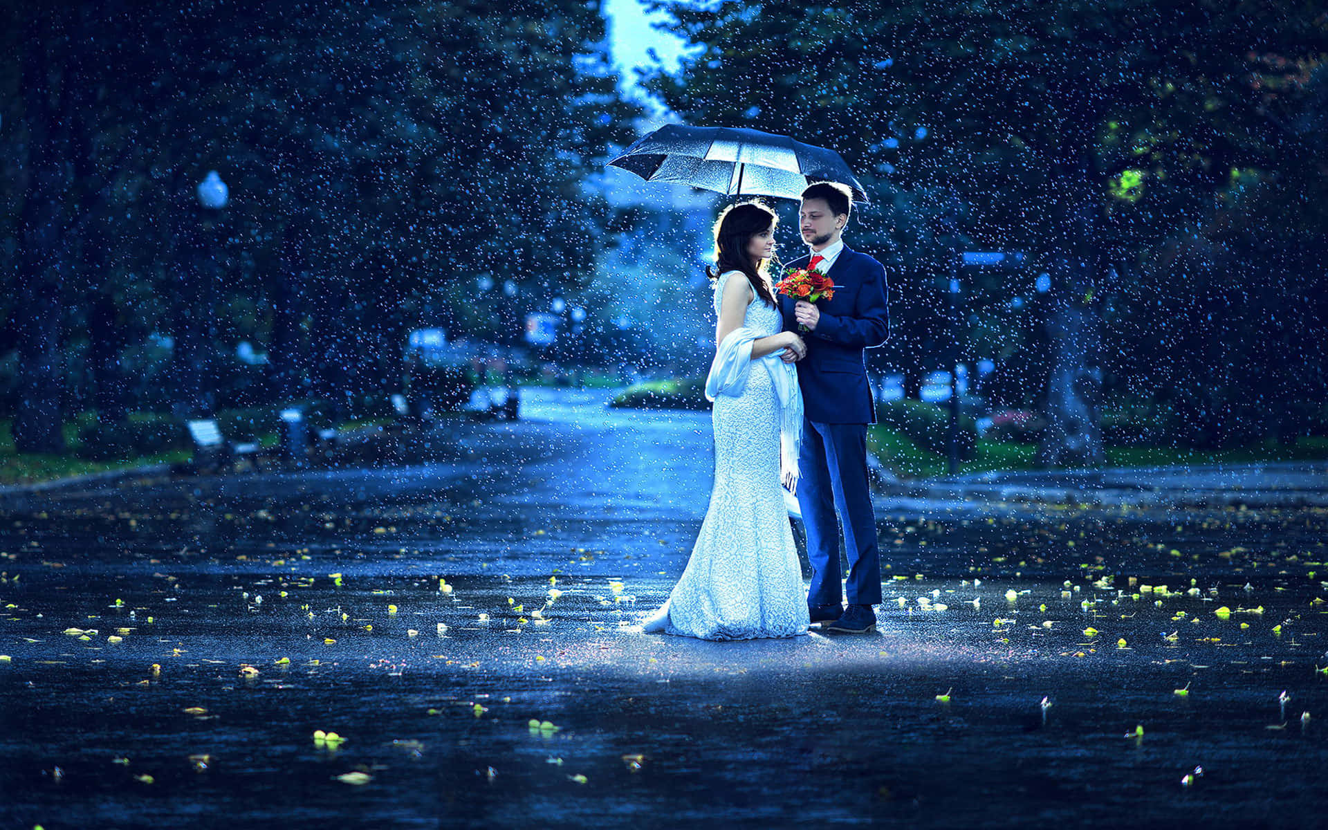 A couple in love, cuddling in the golden rain
