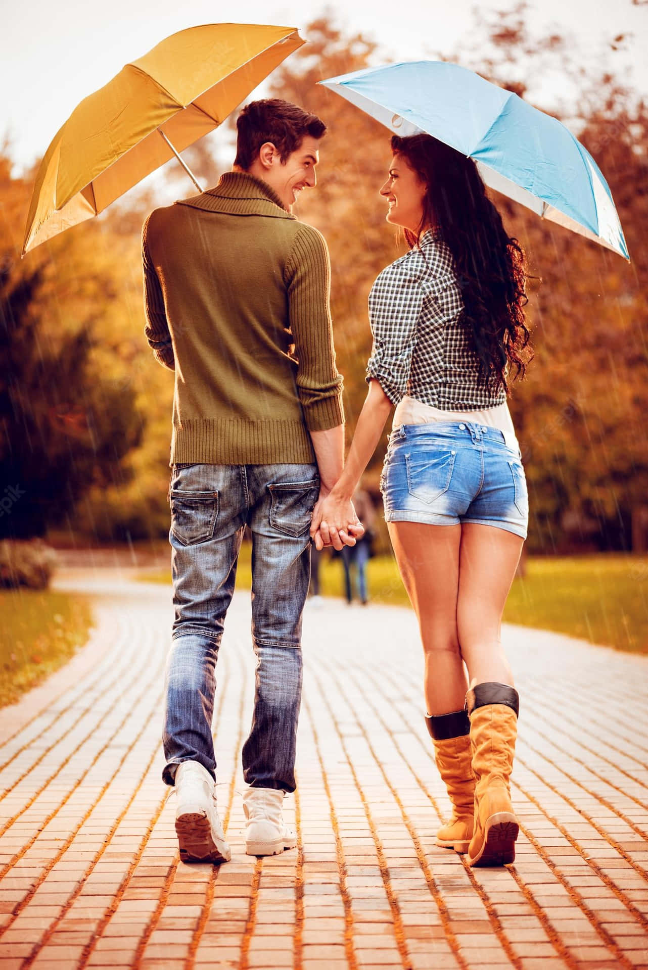 Couple In Rain With Two Umbrellas Picture