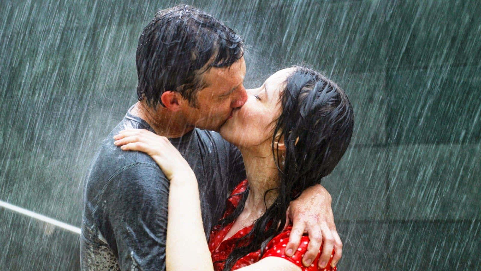 Couple Kissing Each Lips While Raining Wallpaper