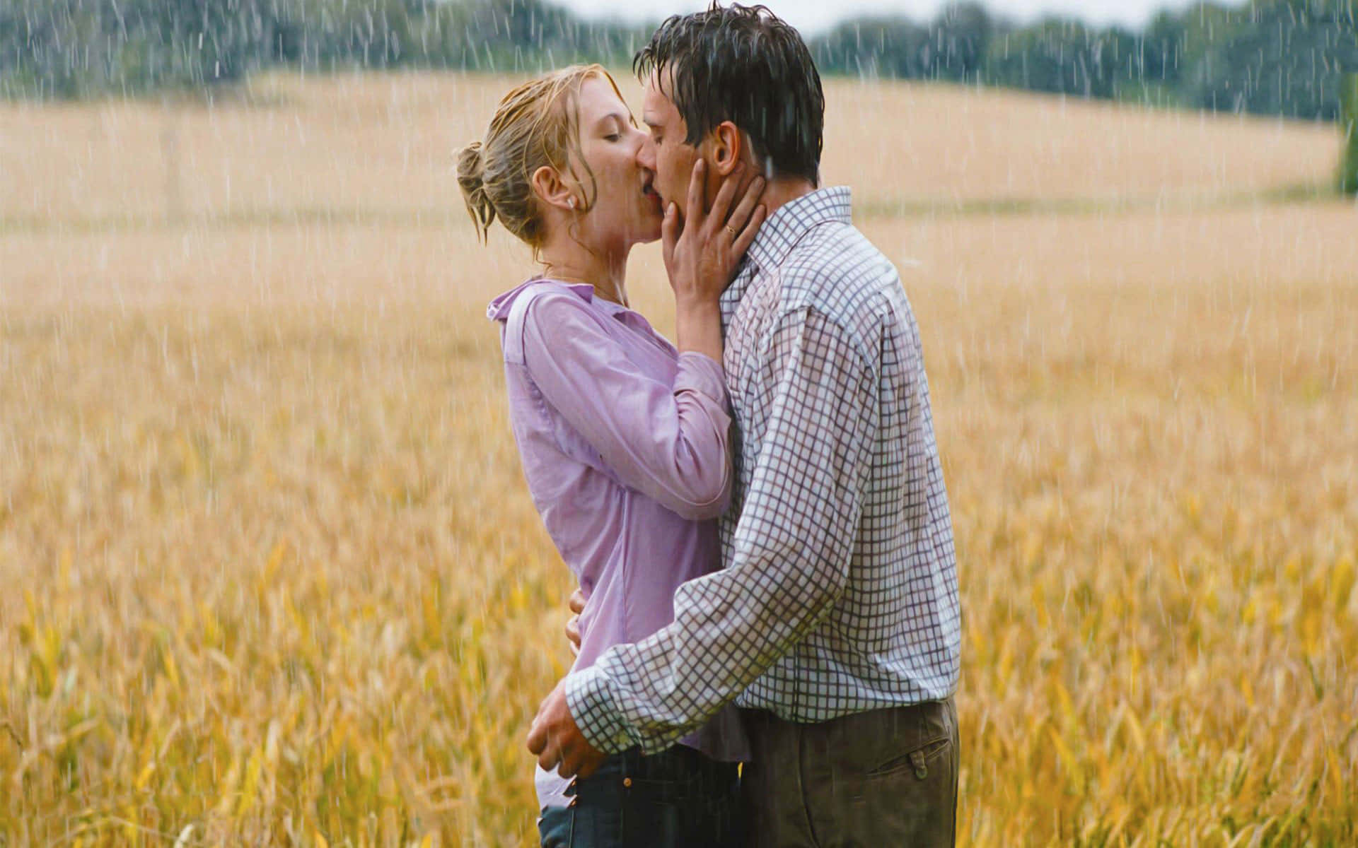 Bildeines Paares, Das Sich Im Weizenfeld Küsst