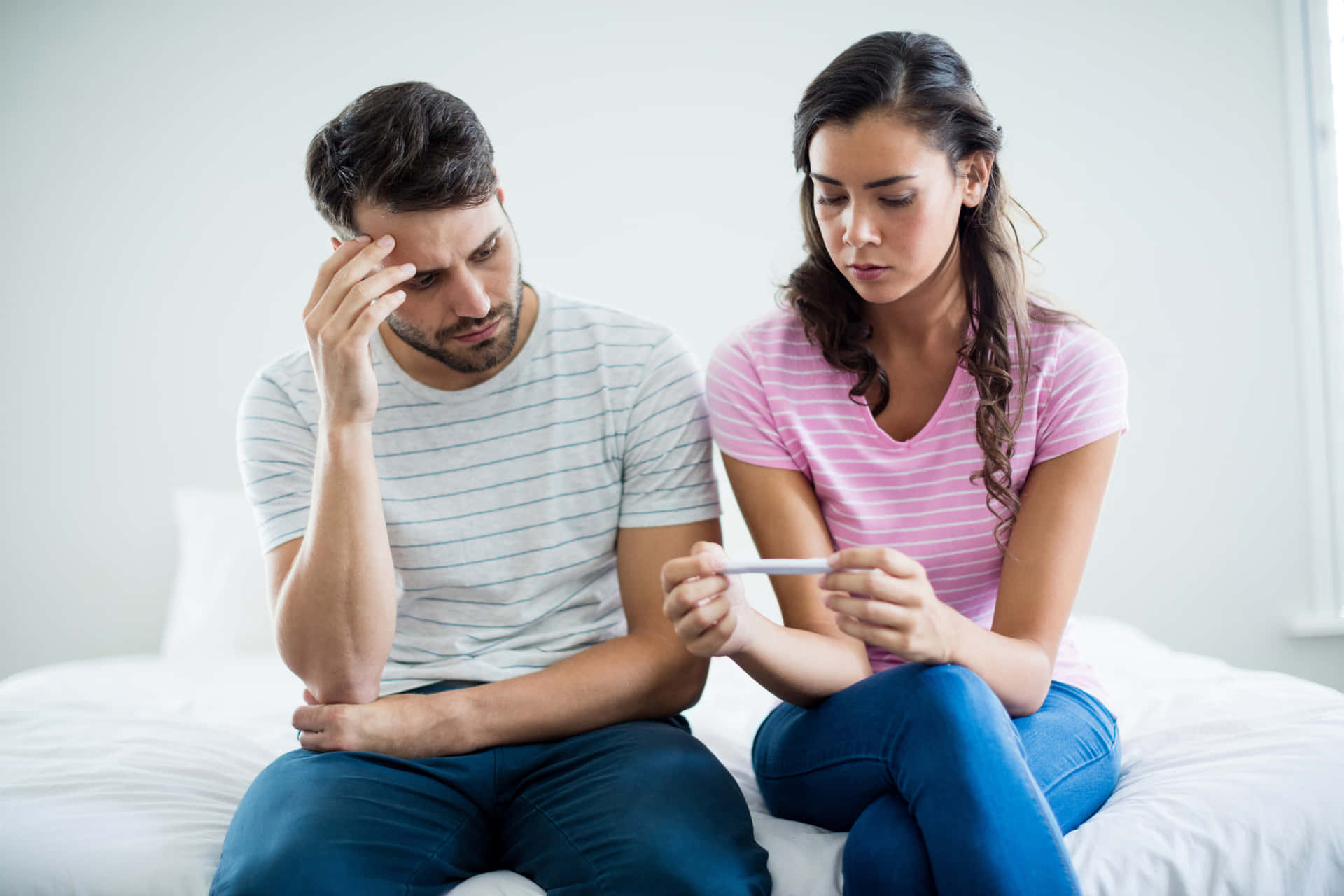 Couple Perturbed About Pregnancy Wallpaper