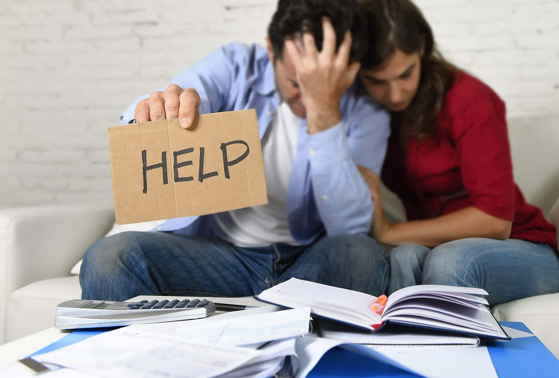 Couple Perturbed By Financial Problems Wallpaper