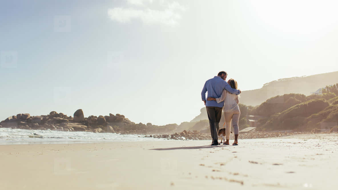 Couple Walking At Beach Picture