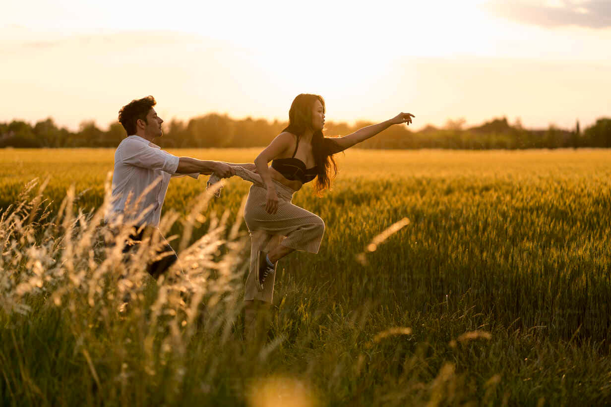 Dancing Couple In The Field Picture