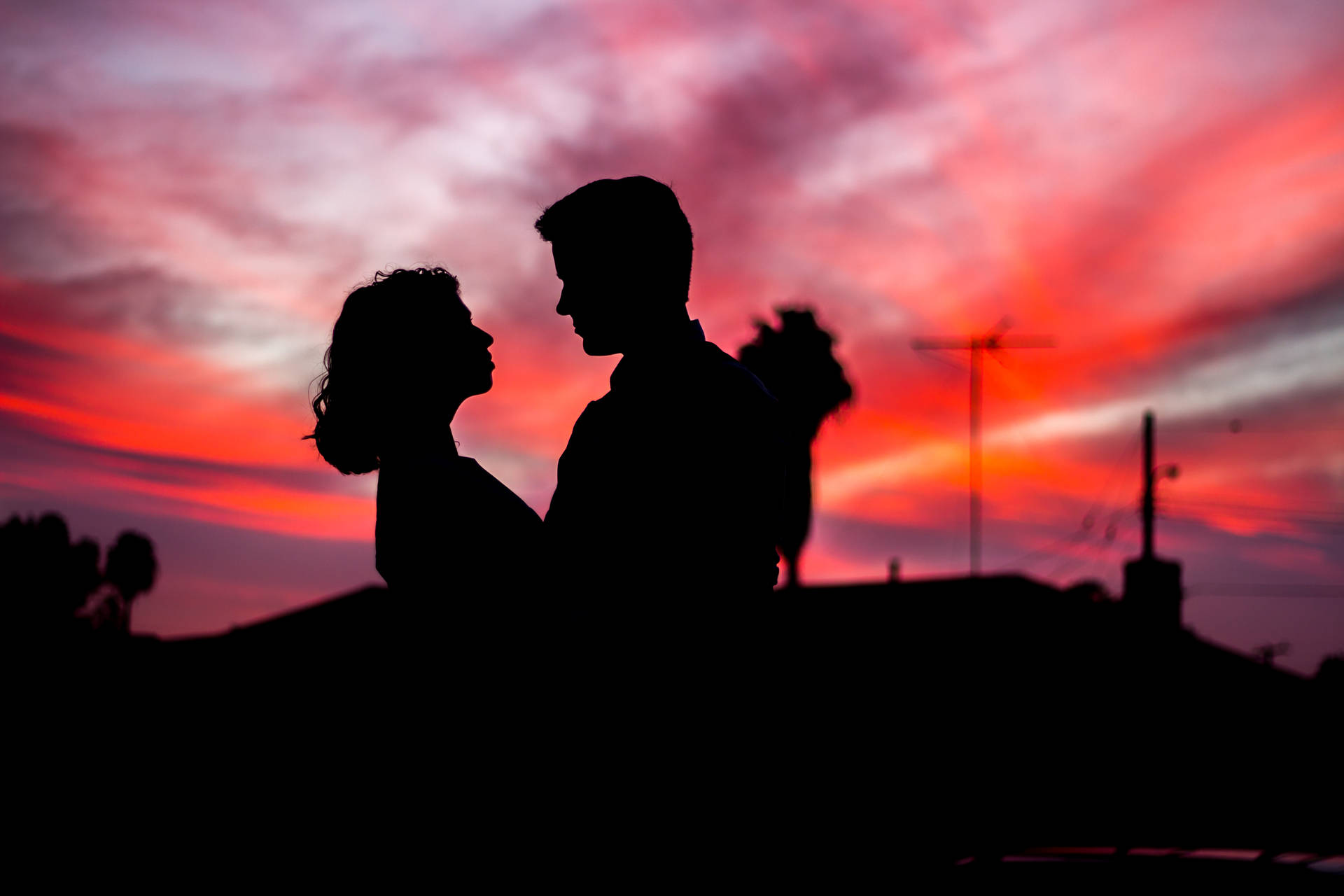 Couple Silhouette On Sunset Background