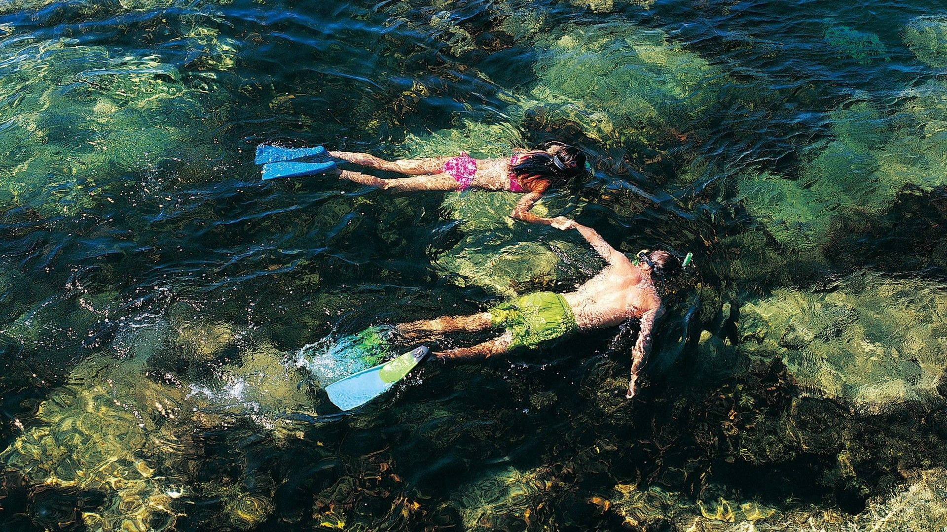 Couple Snorkeling Wallpaper