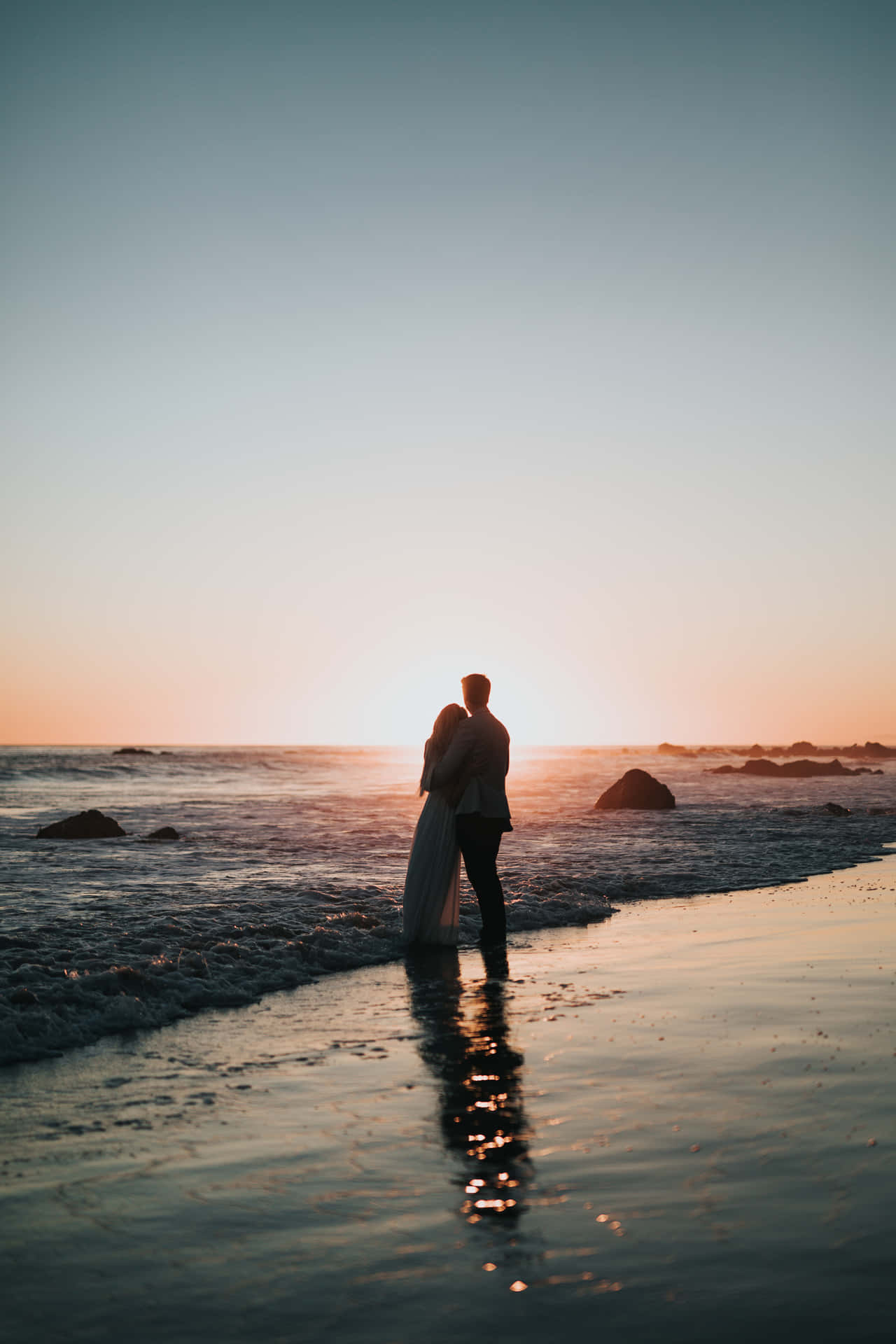 Couple Sunset On Beach Embracing Picture