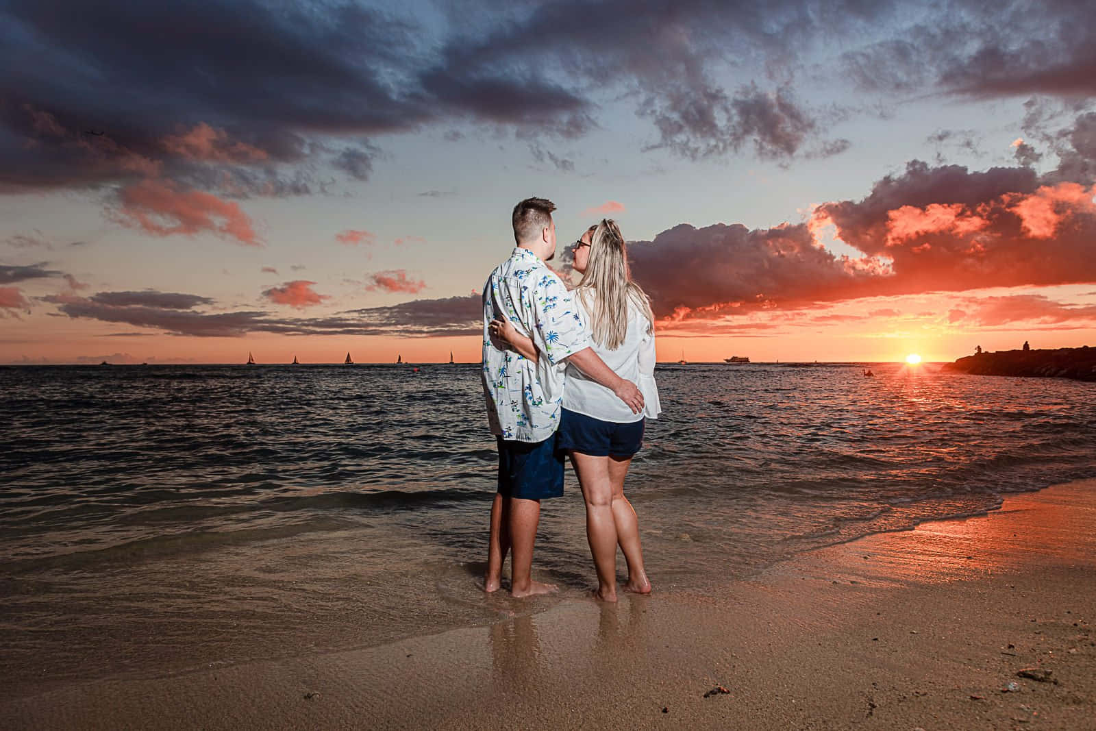 Couple Sunset On Sandy Beach Picture