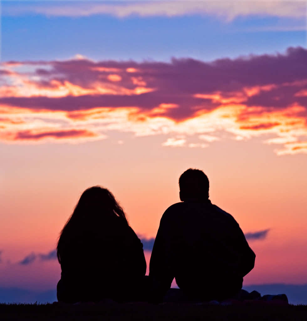 Couple Sunset Silhouette Under Cloudy Sky Picture