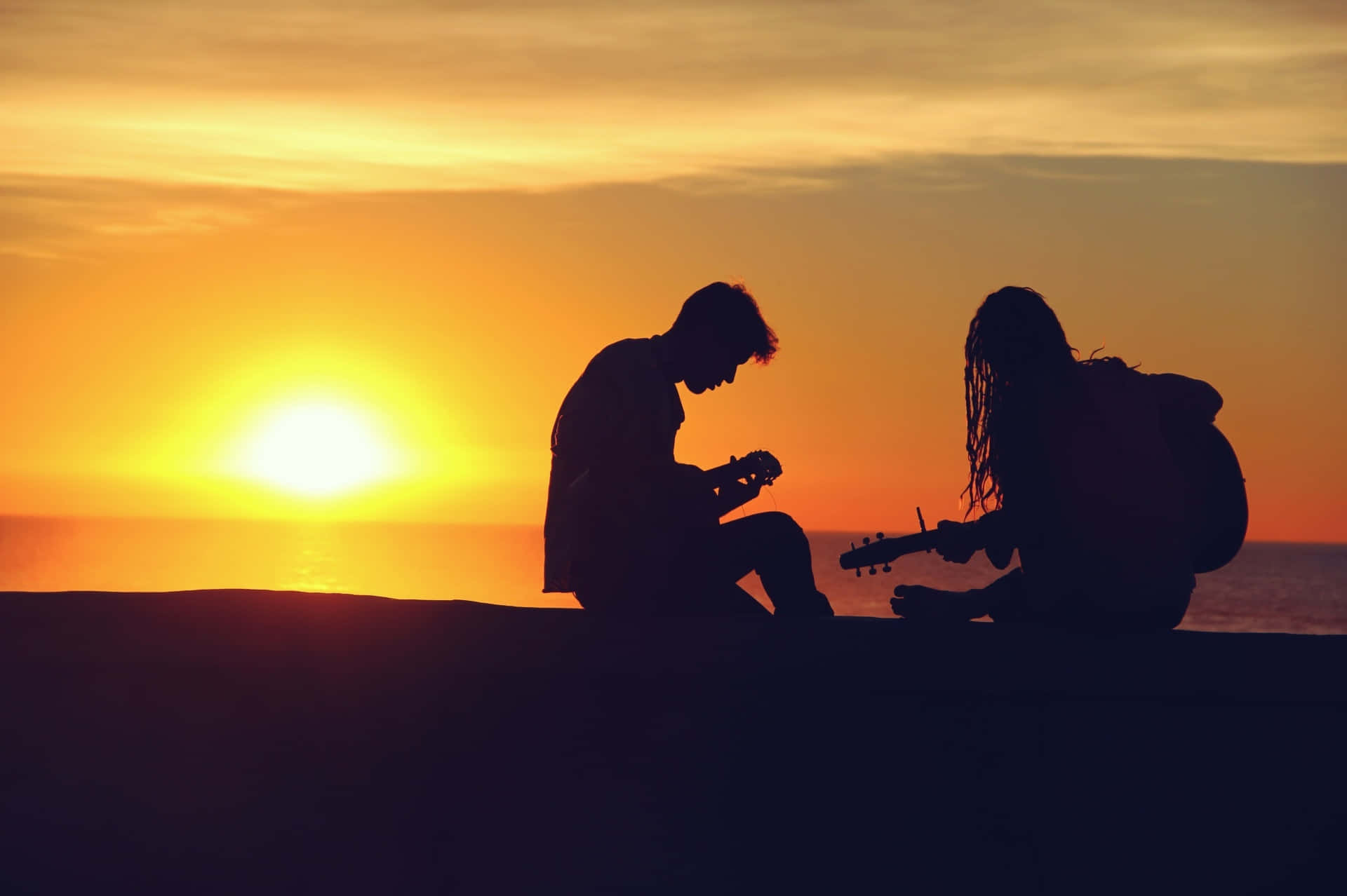 Couple Sunset Playing Guitar Picture