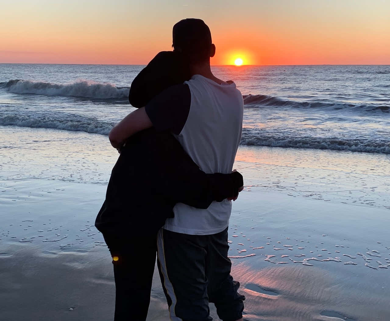 Couple Sunset Hugging At Beach Picture