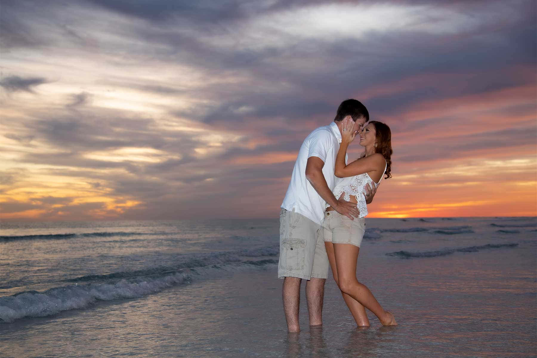 Couple Sunset Kissing On Ocean Water Picture