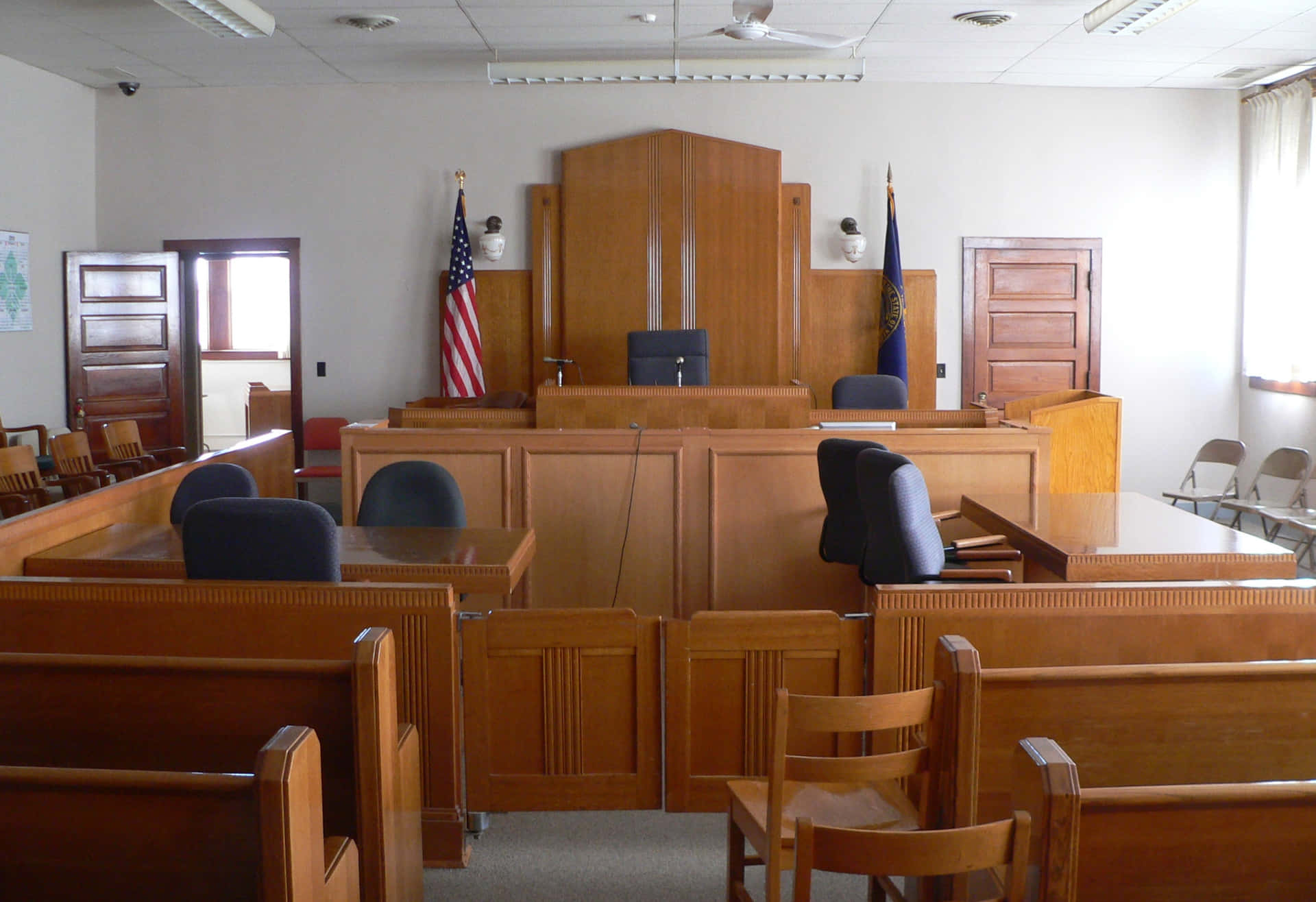A Courtroom With A Bench And Chairs