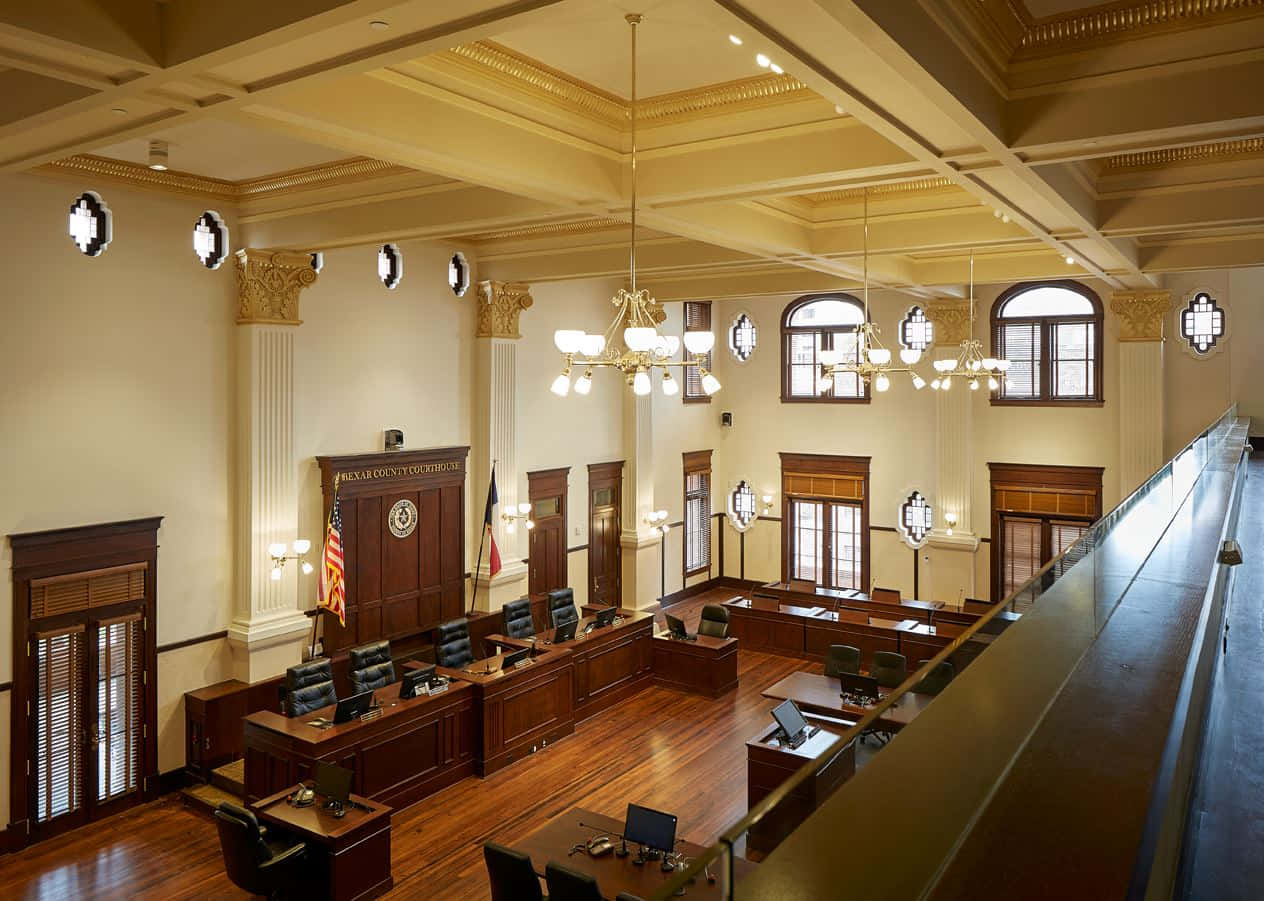A Courtroom With Wooden Floors And Wooden Ceilings