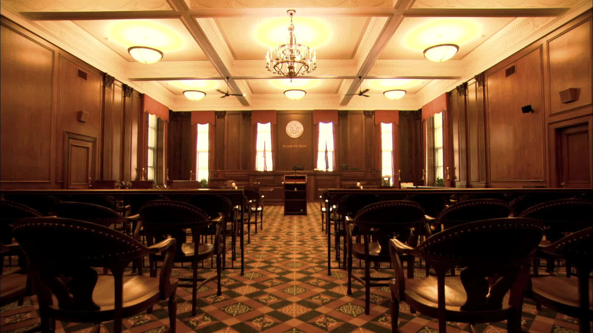 A Courtroom With Rows Of Chairs