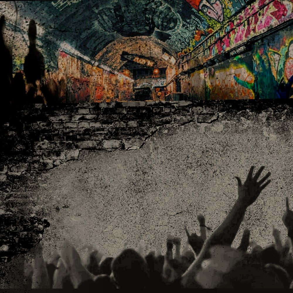 A Poster For A Concert In A Tunnel With Graffiti