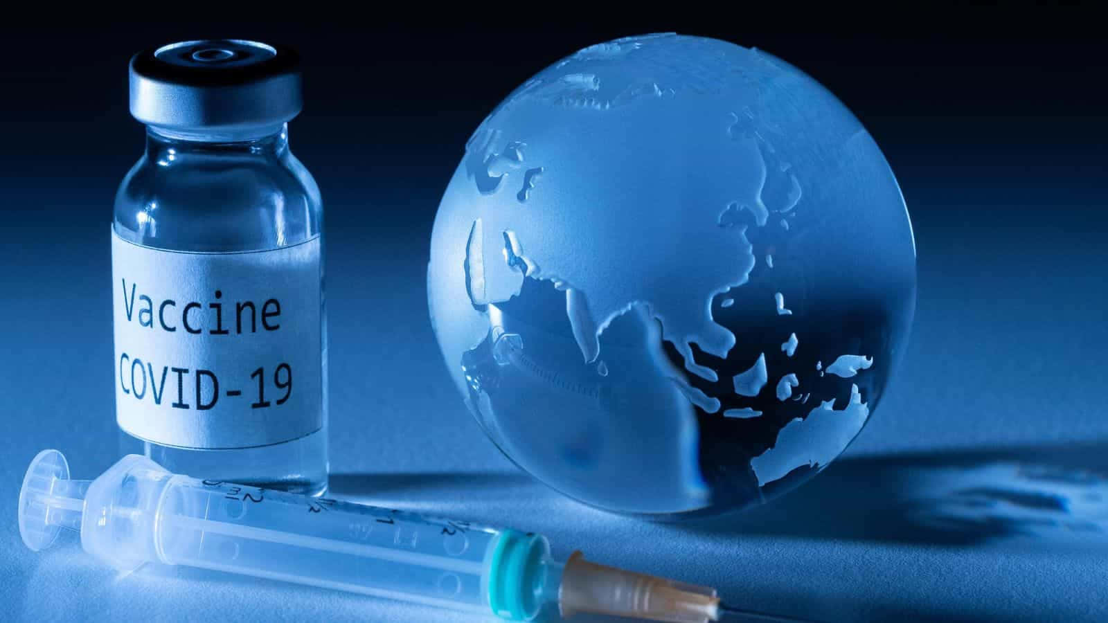 Covid-19 Vaccine Syringe And Earth Globe Background