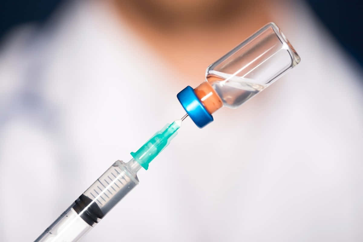 Covid-19 Vaccine Syringe Preparation Background