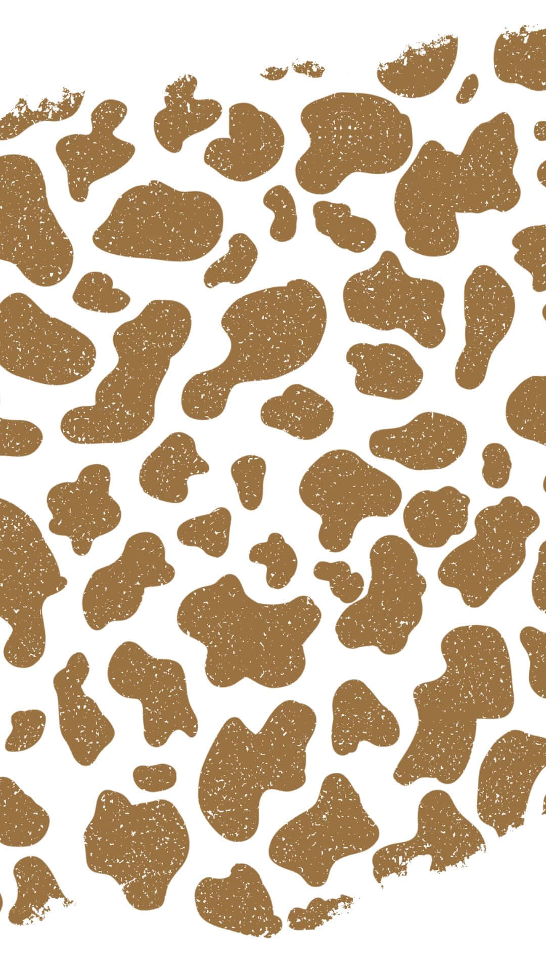 A Brown And White Cow Print Pattern Wallpaper