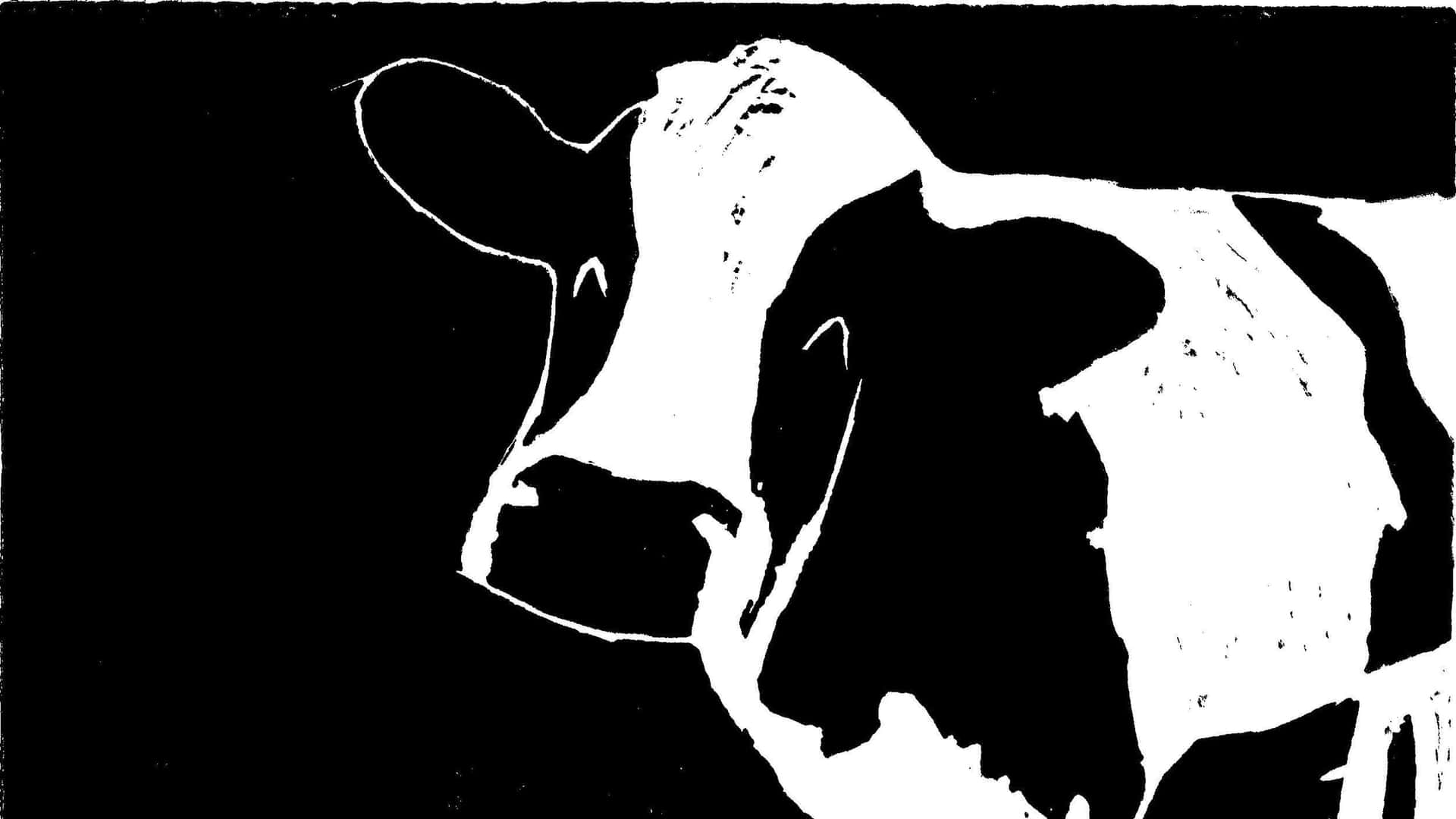 Add a unique flair to your home with a cow print background.