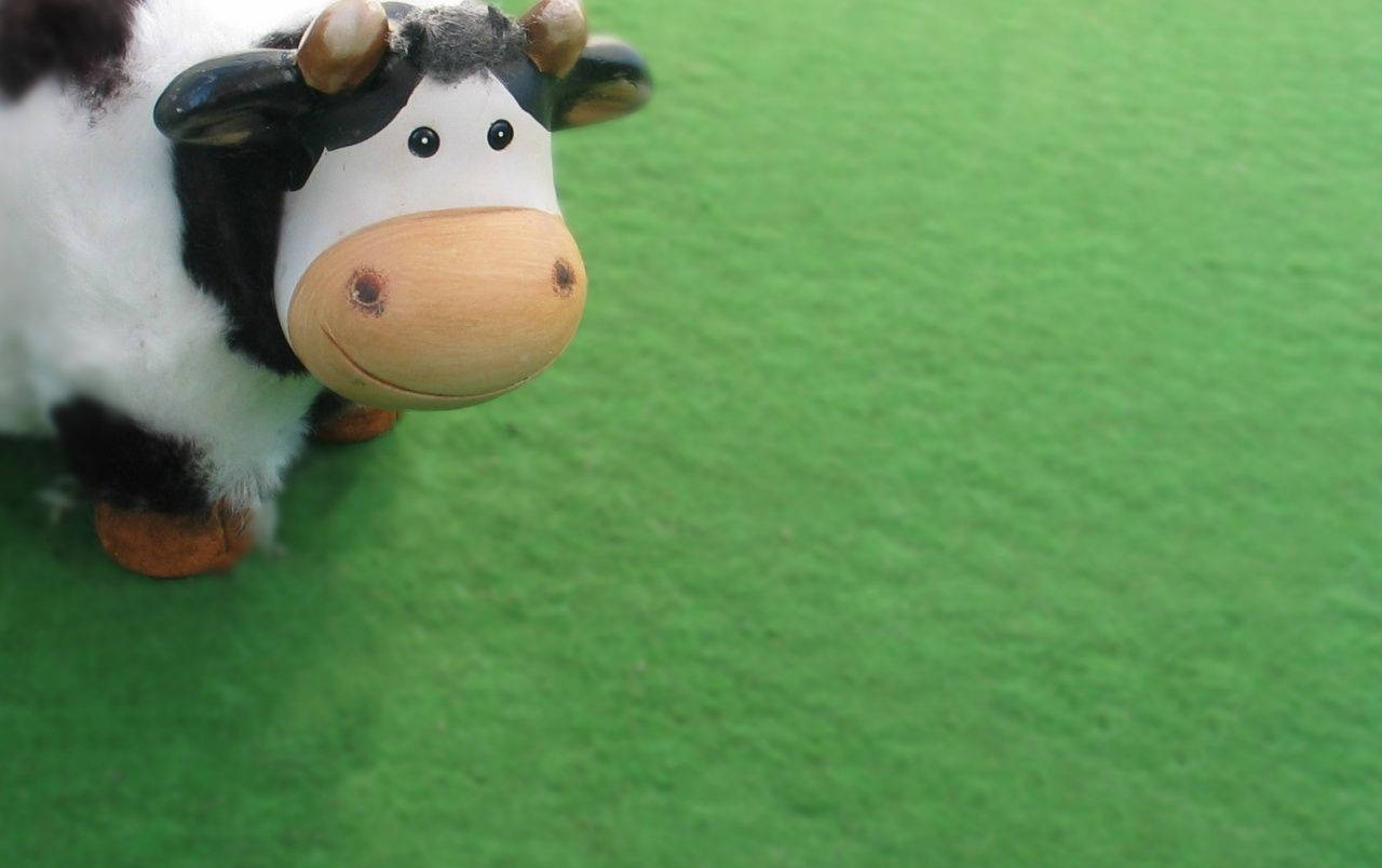 Cow Toy With Smile Wallpaper