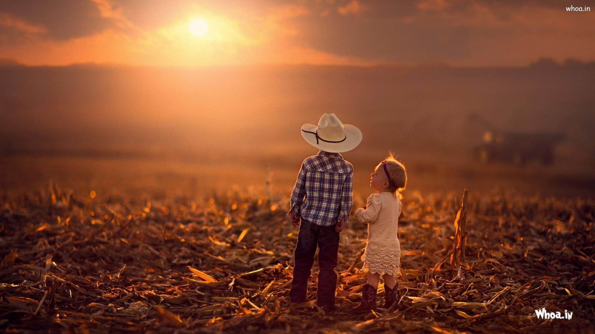 Cowboy Children At Orange Sunset Wallpaper