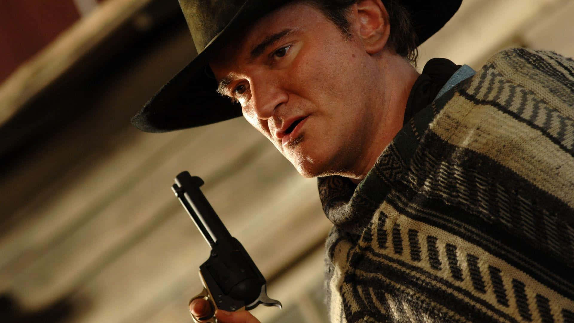 Cowboy Hat Man Holding Gun Wallpaper