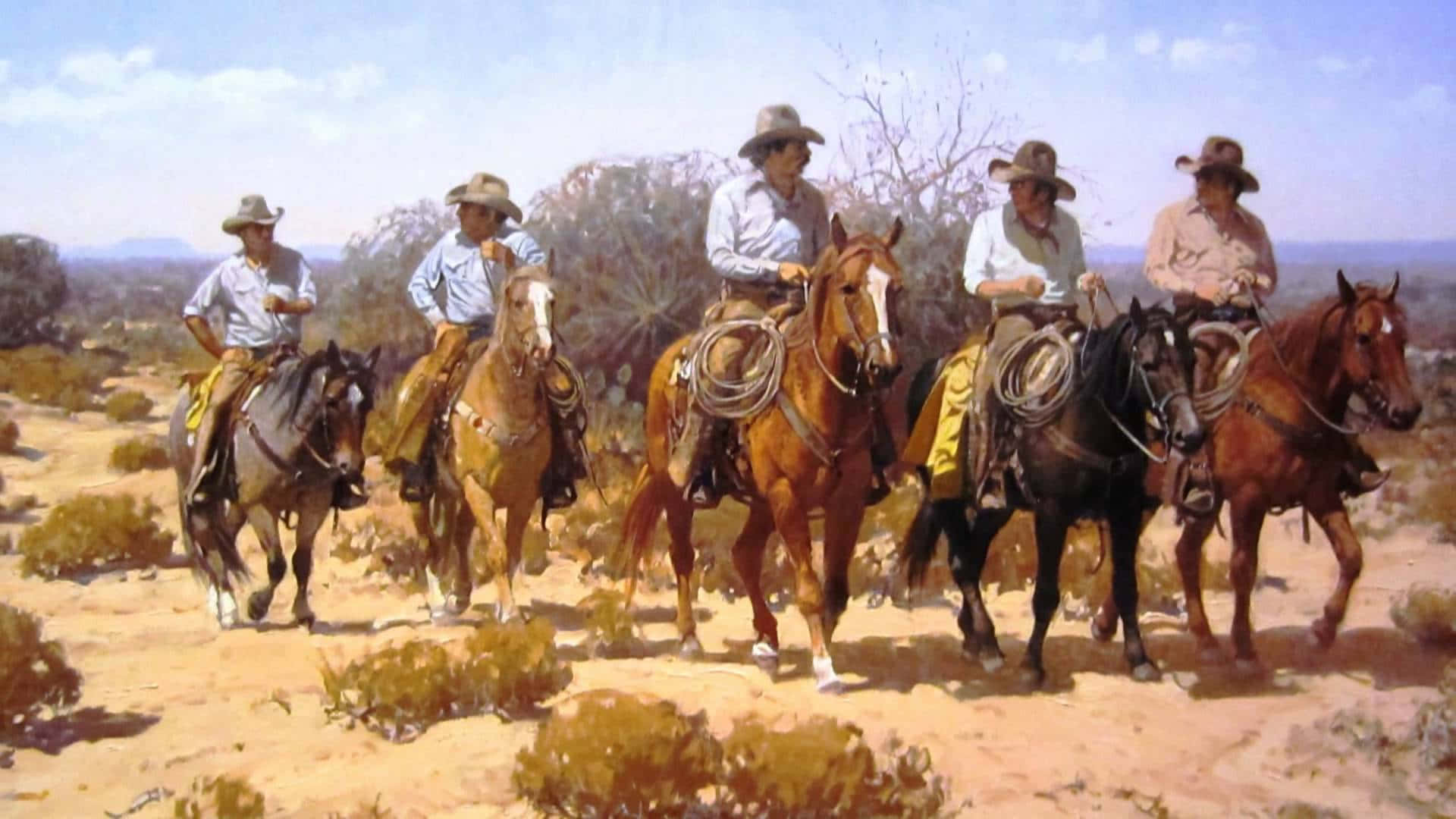 Rugged Cowboys Riding Horses at Sunset