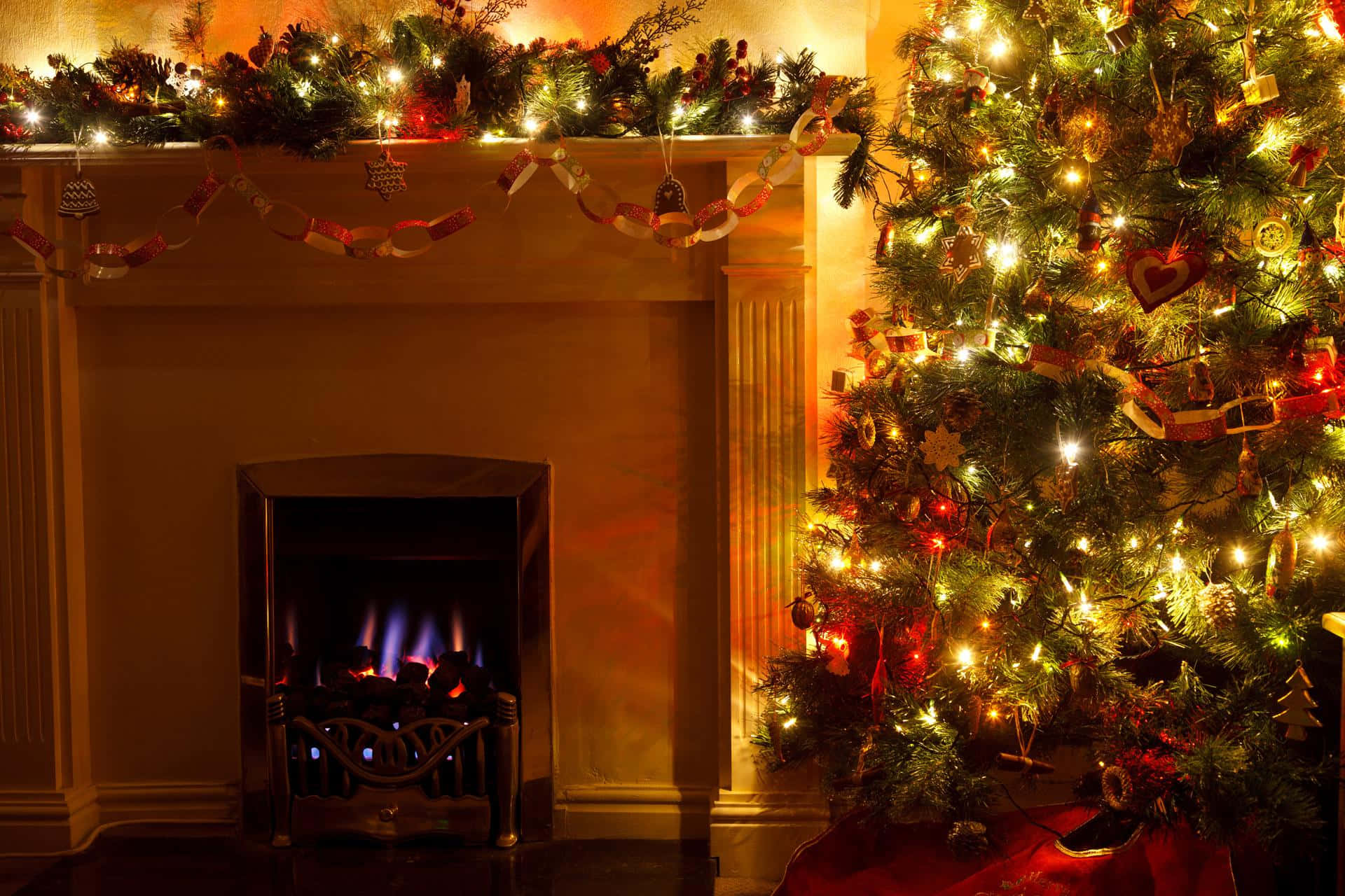 Cozy Christmas Fireplaceand Tree Wallpaper