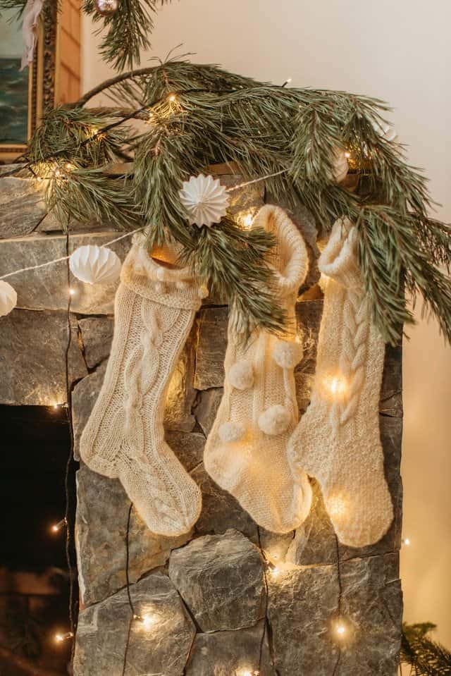 Cozy Christmas Stockings Fireplace Decor Wallpaper
