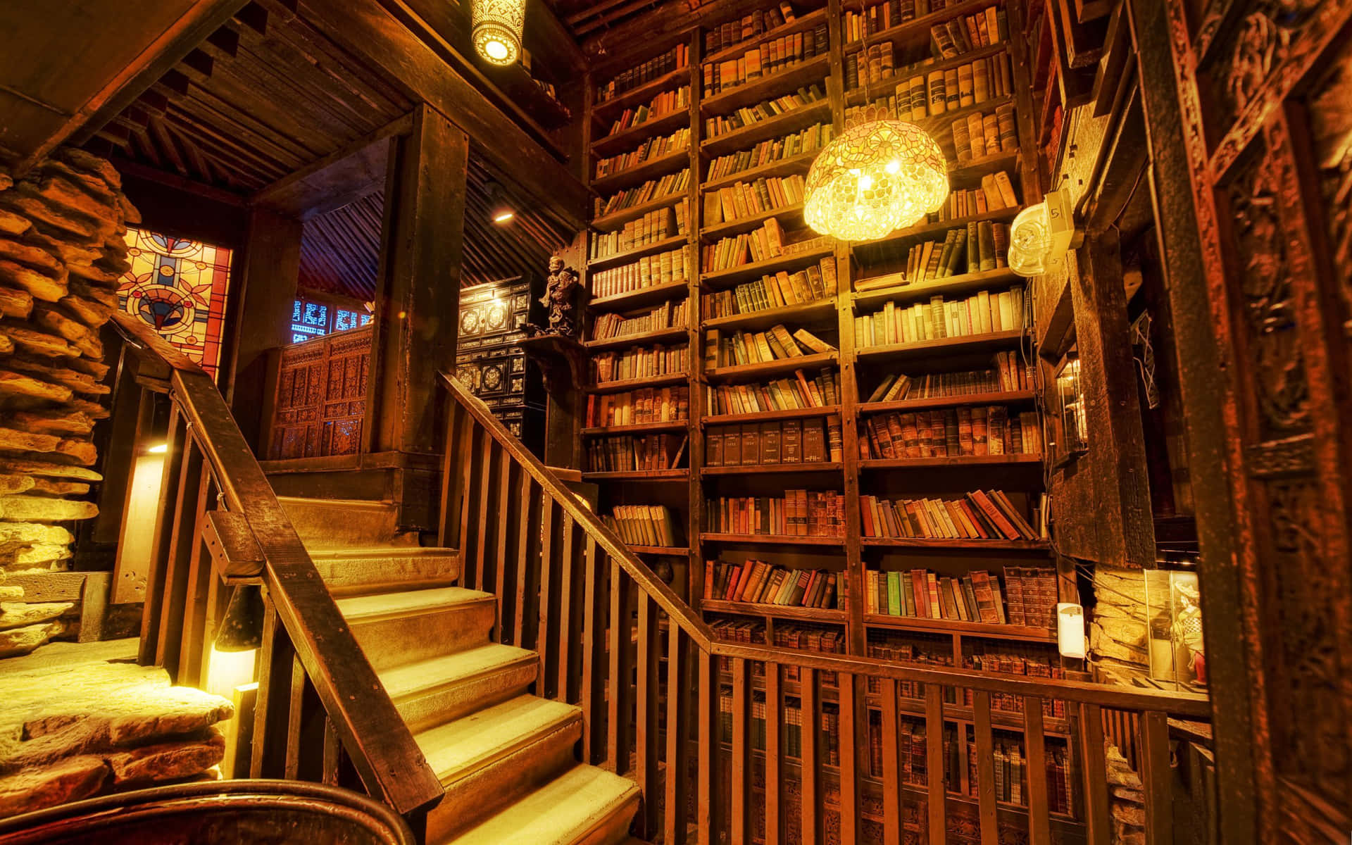 En trappe, der fører til et bibliotek af viden Wallpaper