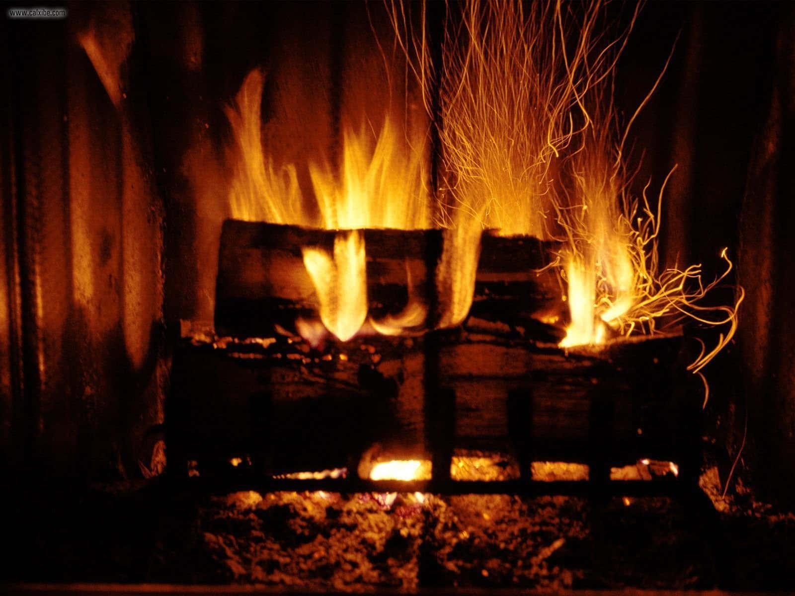 Warm and inviting cozy fire Wallpaper