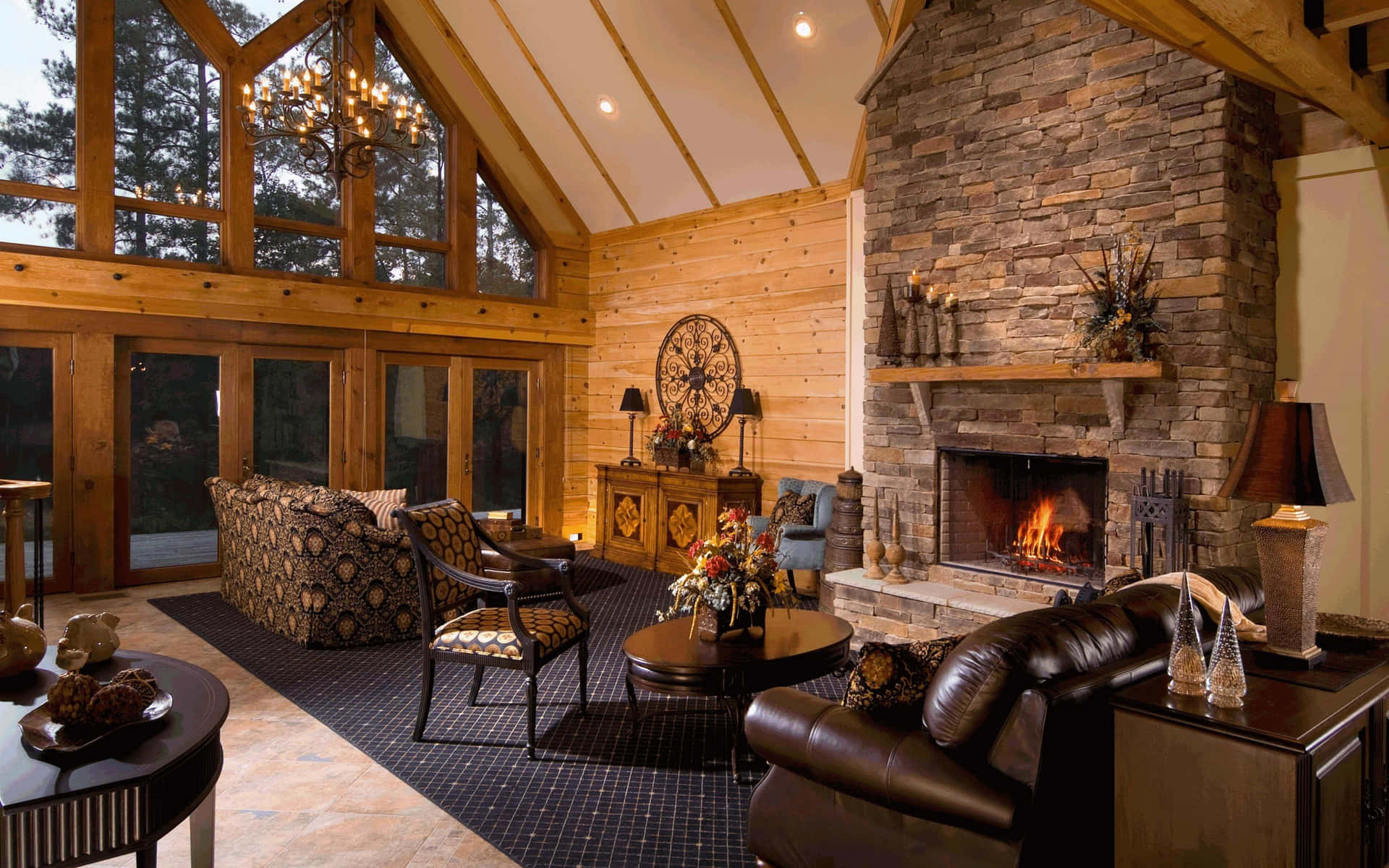 A warm and inviting cozy fire in a fireplace Wallpaper