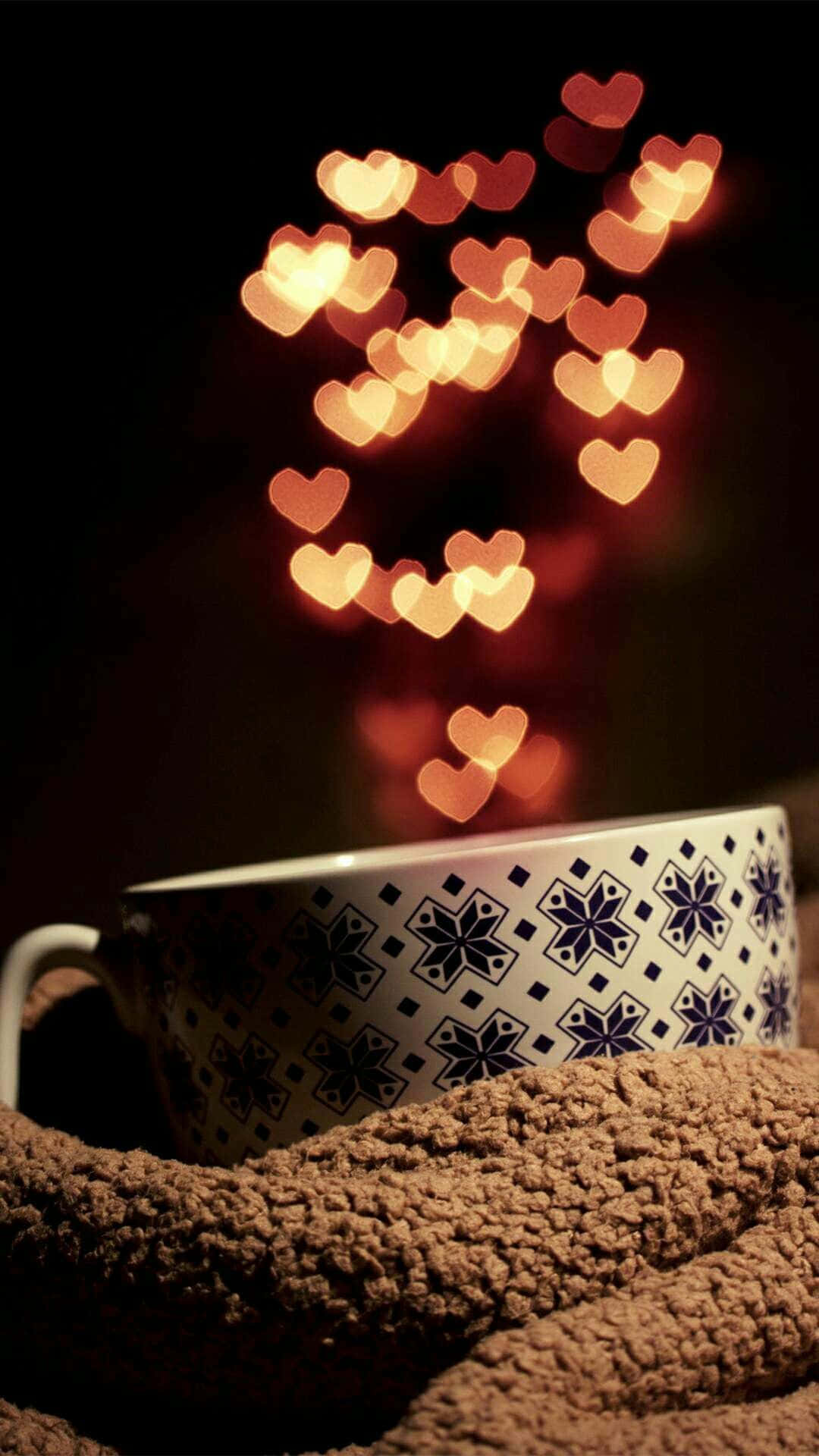 A Cup With Hearts On It Wallpaper