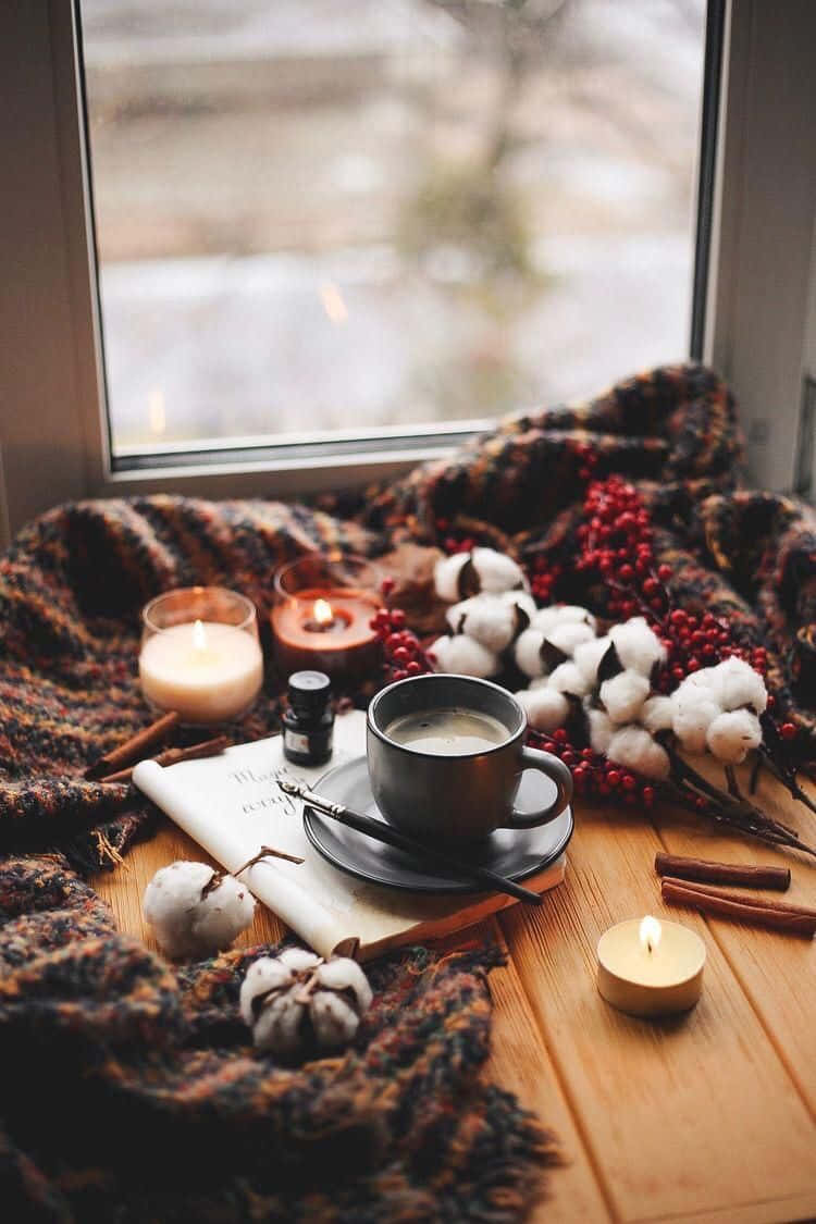 A cozy moment with a cup of tea and your iPhone Wallpaper