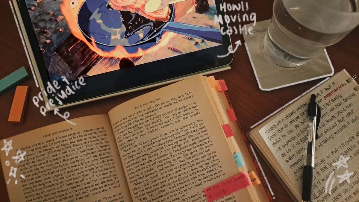 Cozy Reading Sessionwith Animated Film Wallpaper