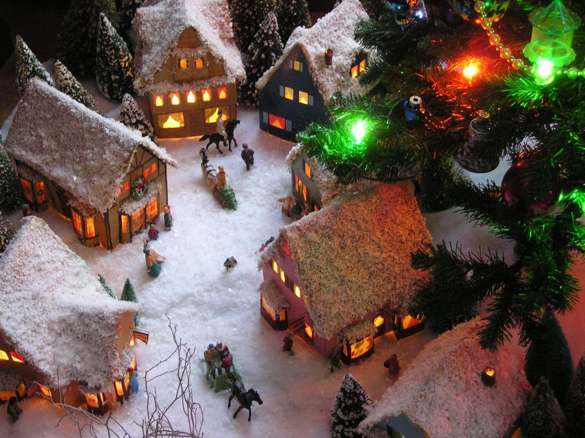 Cozy Snowy Christmas Village Wallpaper
