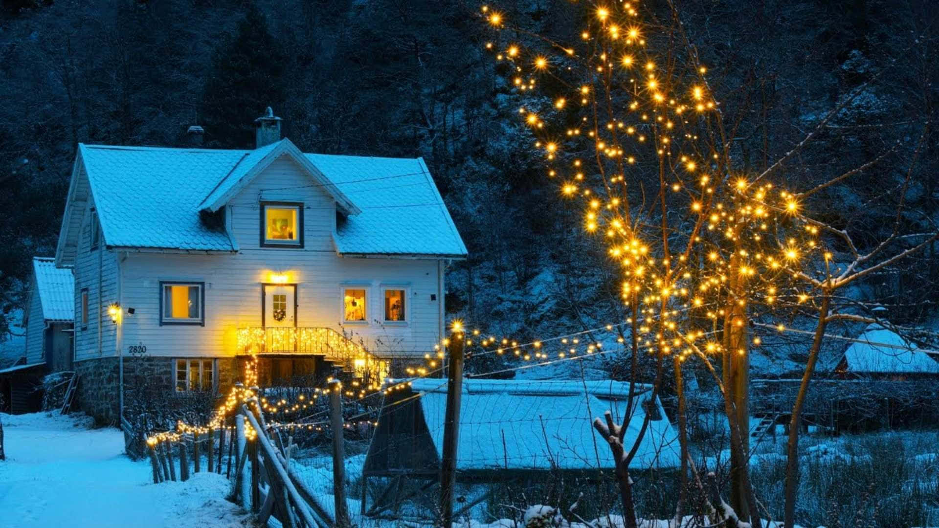 Cozy Winter Home With Lights Wallpaper