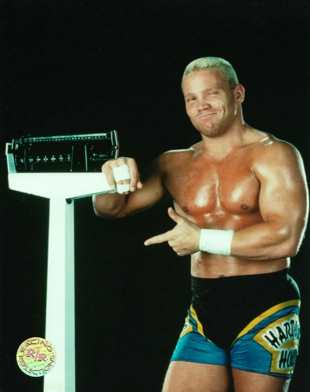 Crash Holly With A Weighing Scale Wallpaper