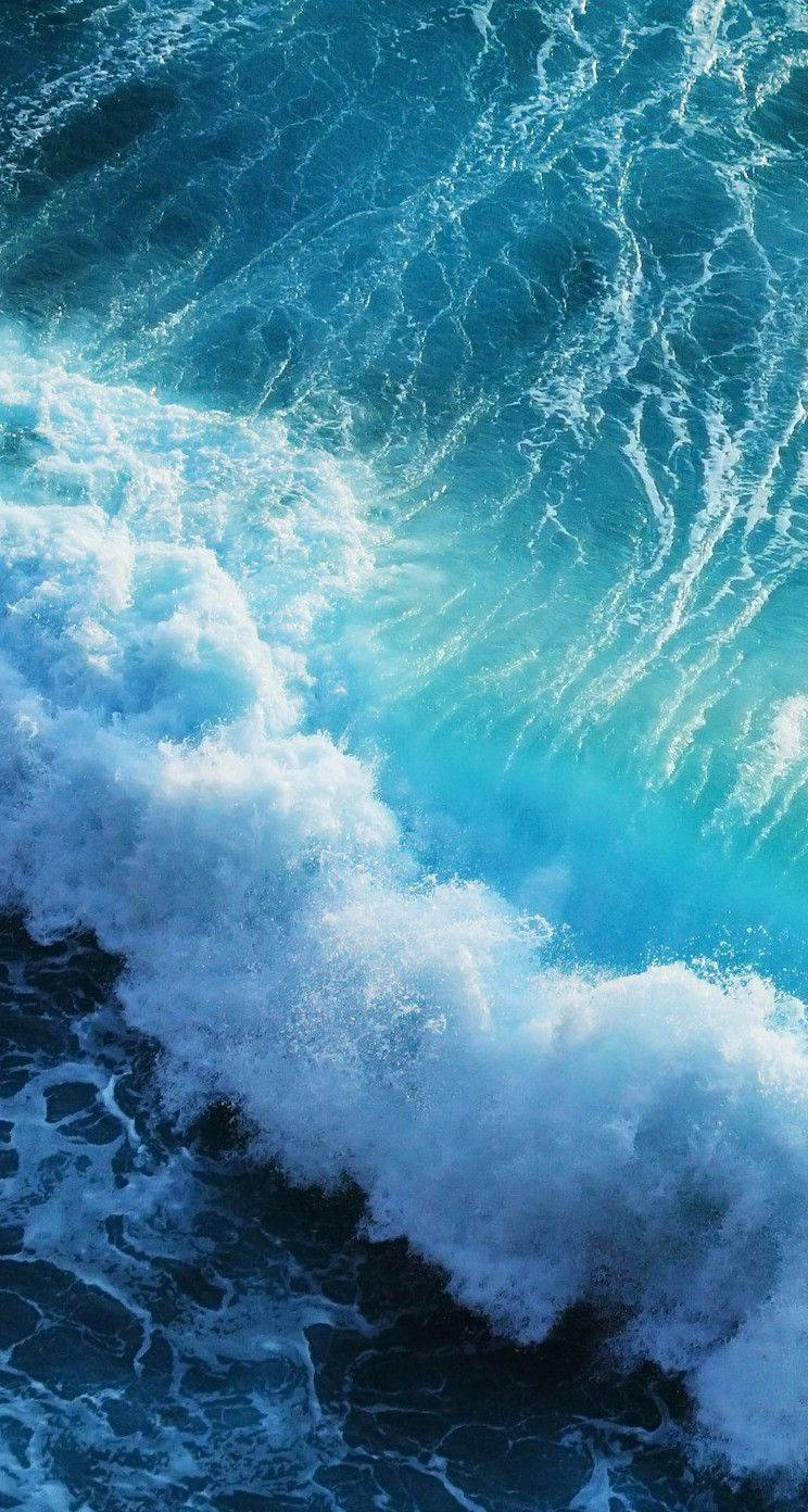 Kræsjende havbølger Iphone live tapet Wallpaper