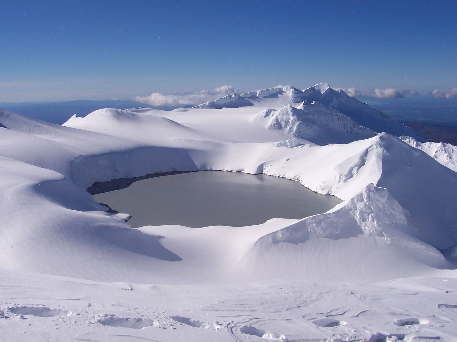 Crater With Cold Snow Wallpaper