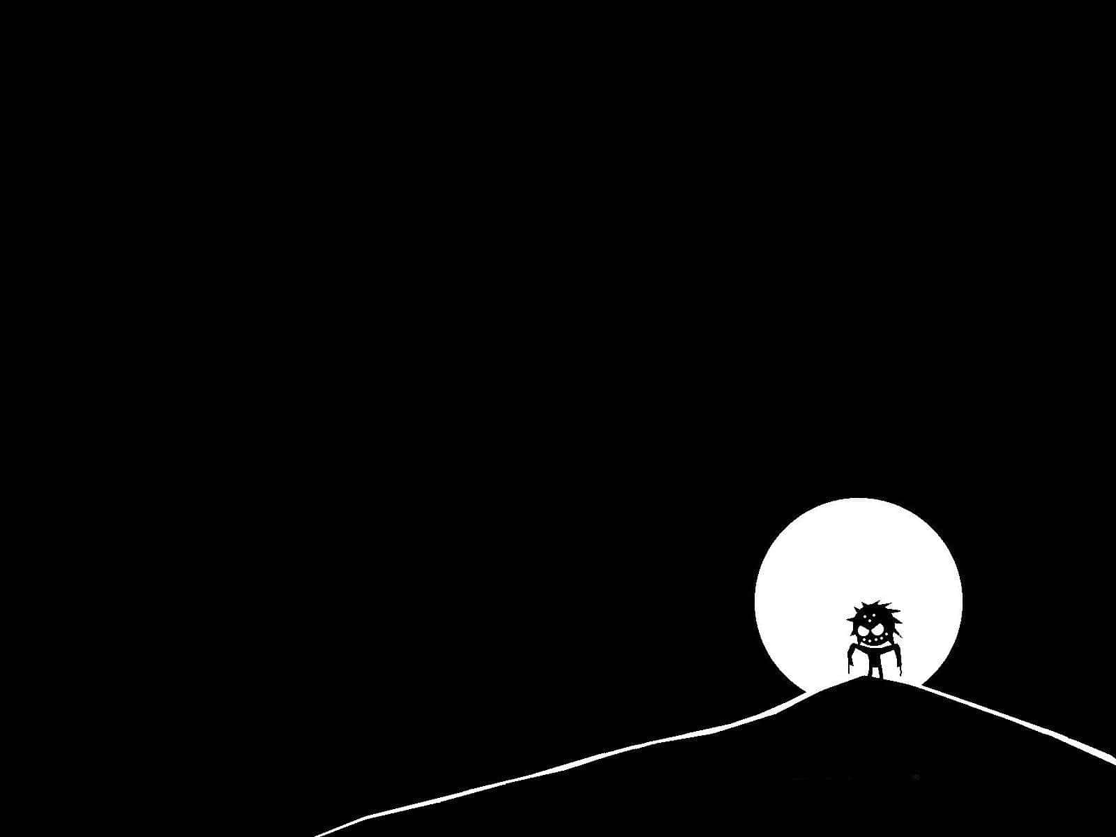 A Black And White Image Of A Man On A Hill Wallpaper